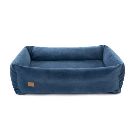 Blue pet bed with a visible brand label on a white background